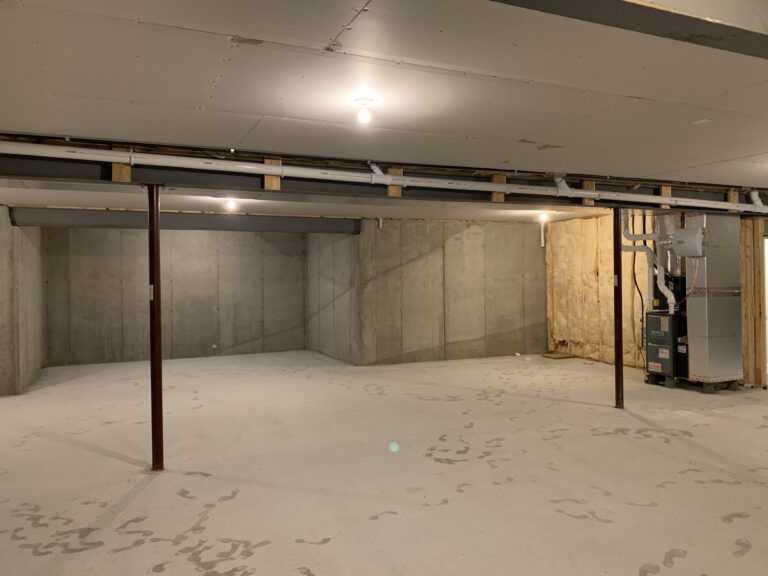 Oliver Construction Services - Before Remodel - Basement